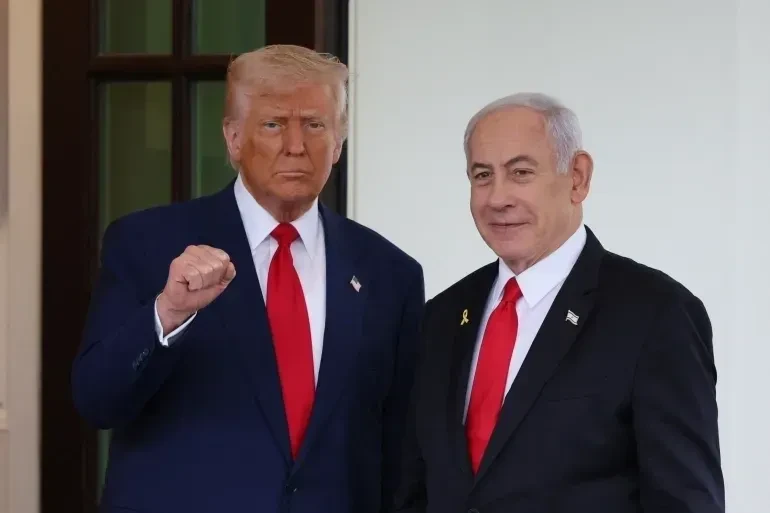 Two men in suits at formal meeting